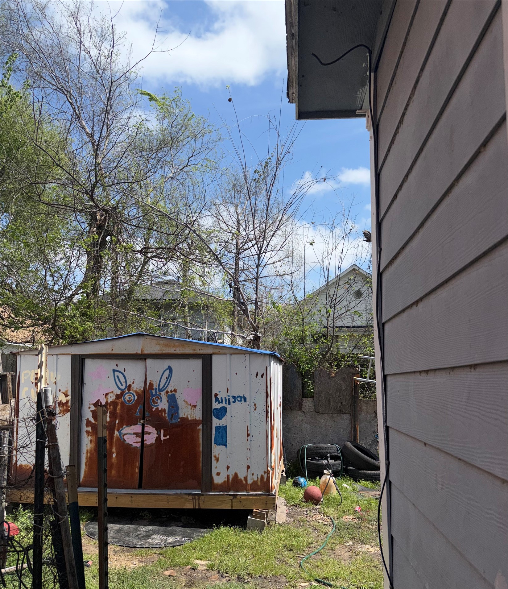 11914 Anchick Street Houston, TX 77076 - Photo 3 of 17 a view of a backyard