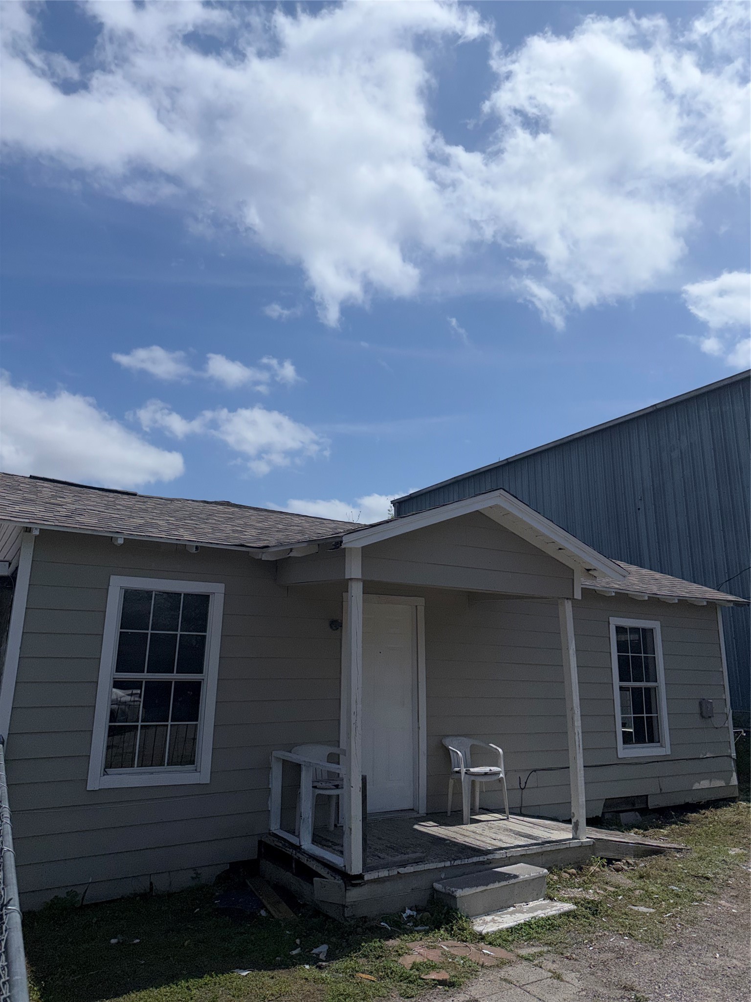 11914 Anchick Street Houston, TX 77076 - Photo 5 of 17 a view of a house with backyard and porch