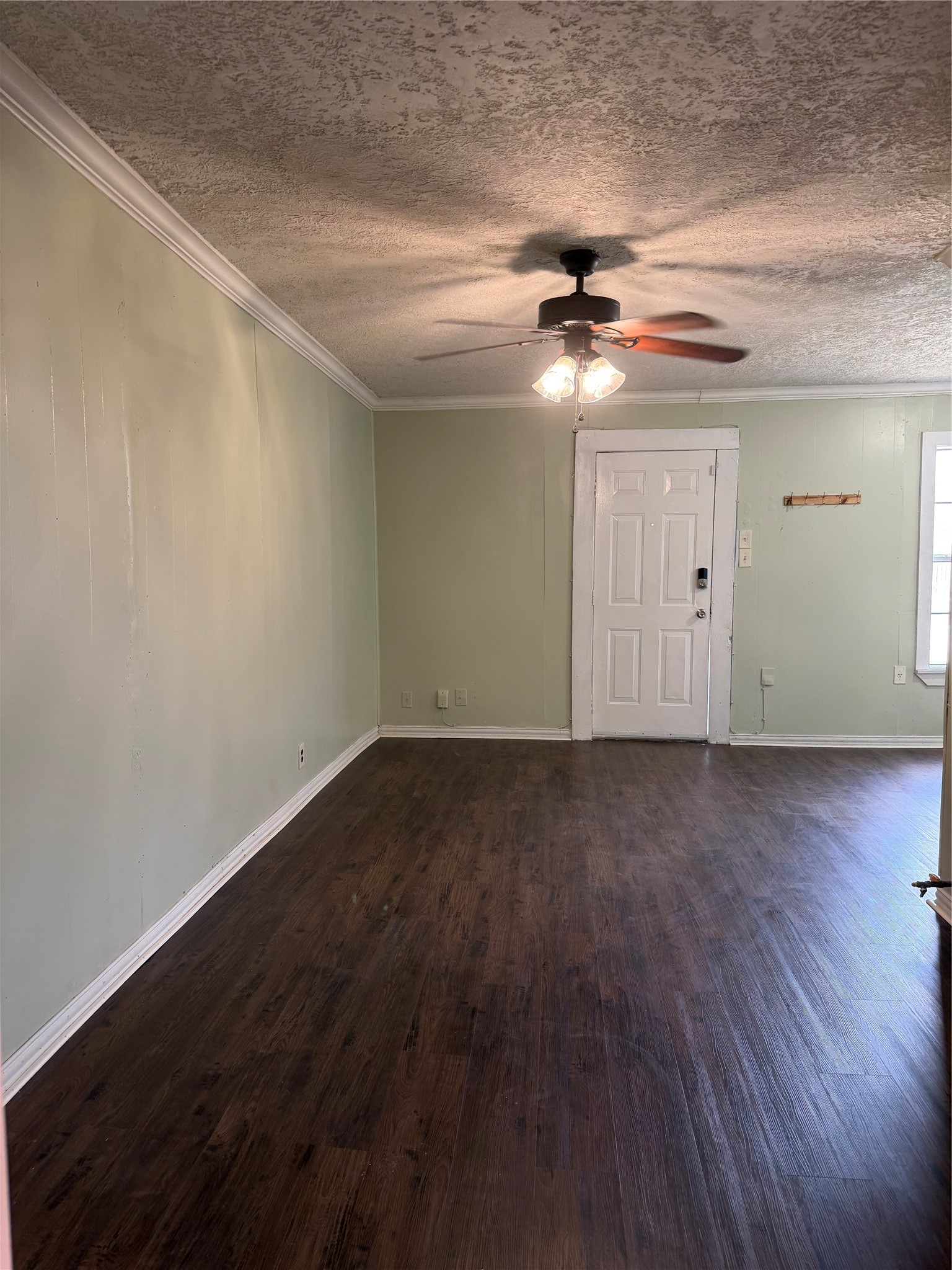 11914 Anchick Street Houston, TX 77076 - Photo 8 of 17 wooden floor in an empty room
