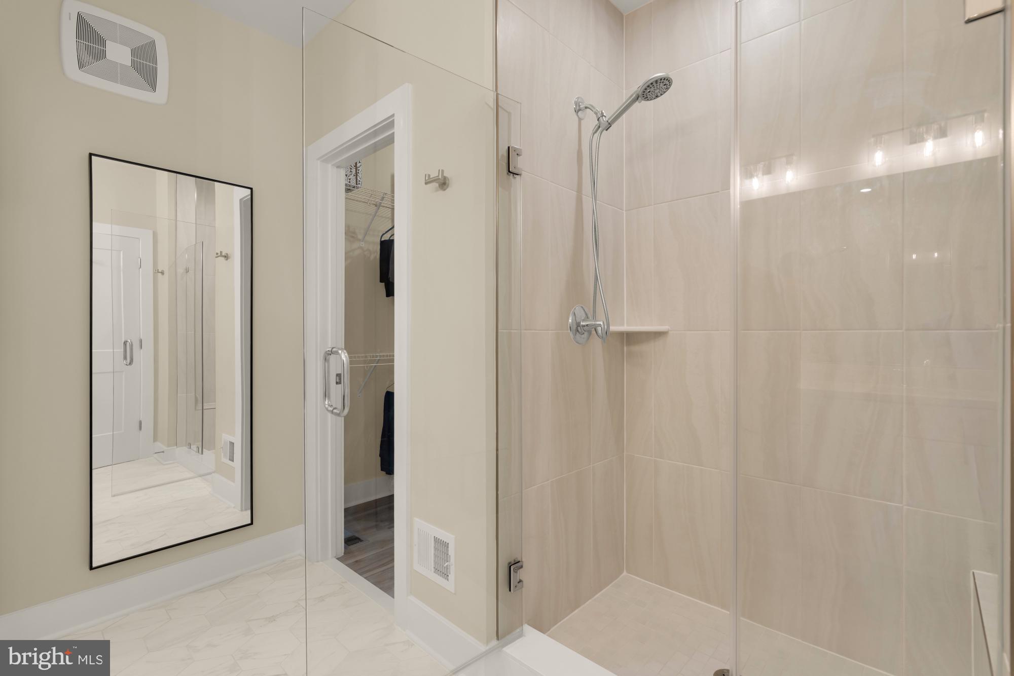 1704 Bandit Loop, Unit 20A Reston, VA 20190 - Photo 12 of 32 a bathroom with a shower