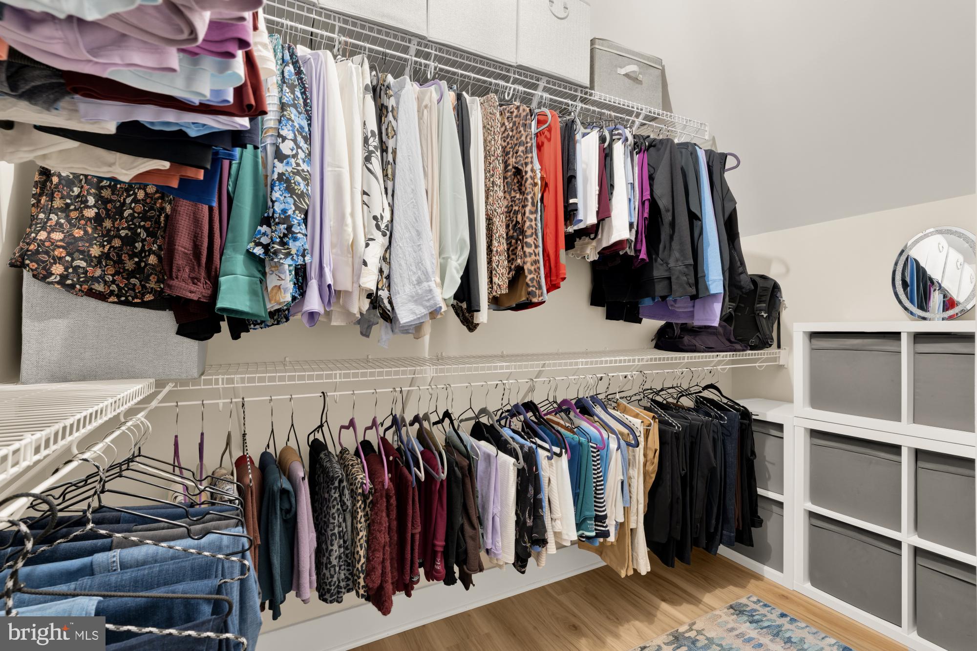 1704 Bandit Loop, Unit 20A Reston, VA 20190 - Photo 13 of 32 a view of walk in closet with clothes and shoes