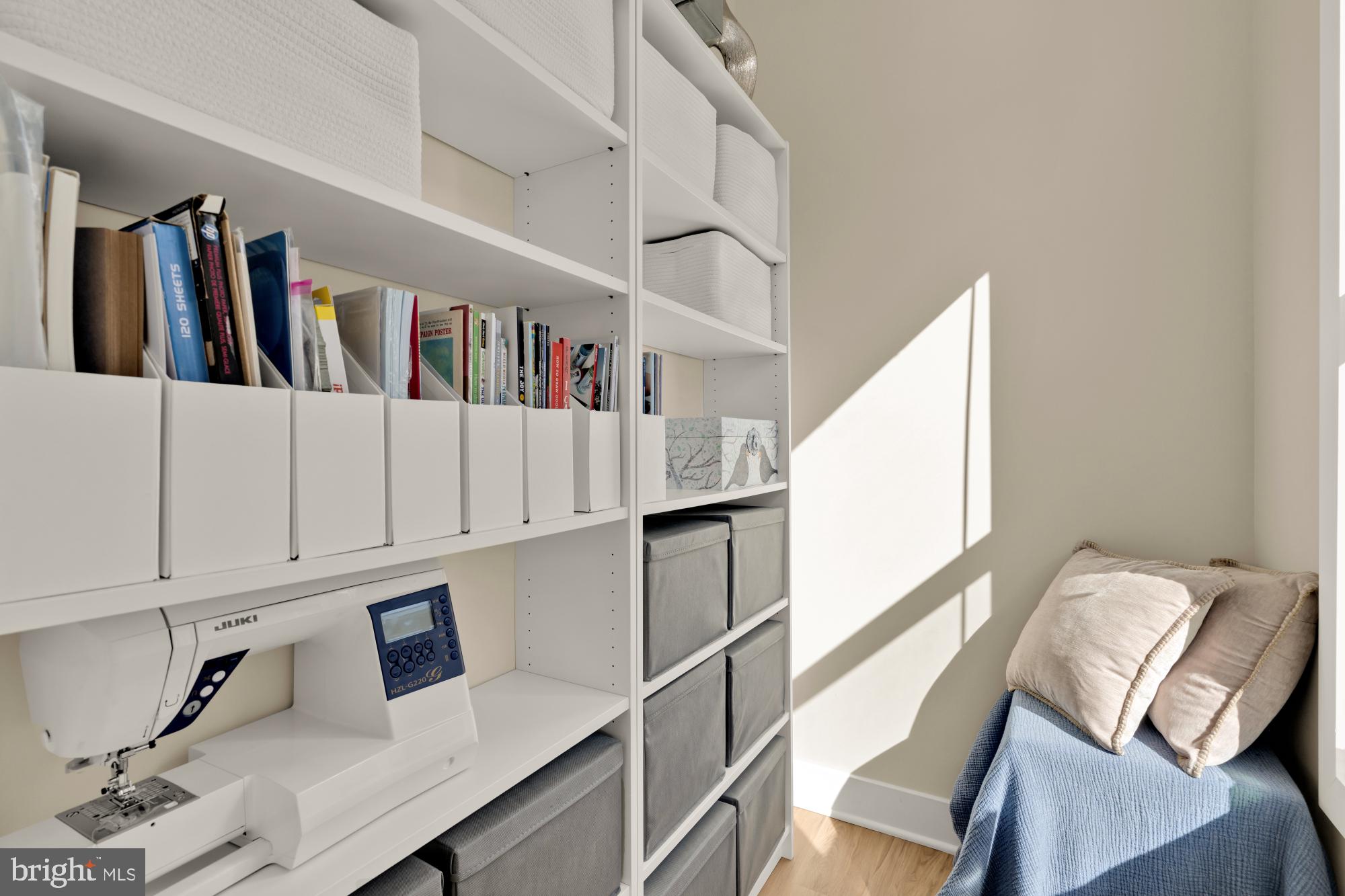 1704 Bandit Loop, Unit 20A Reston, VA 20190 - Photo 14 of 32 a view of a living room and workspace