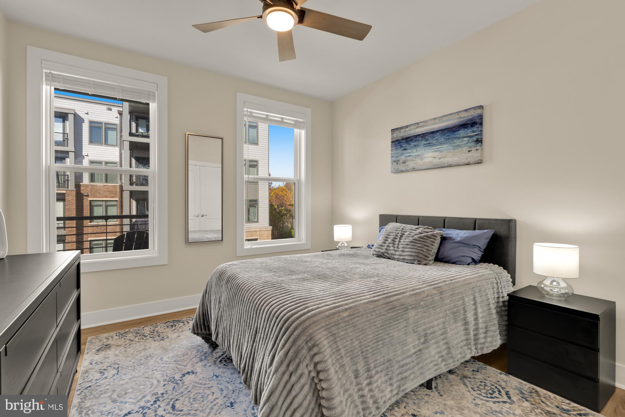 1704 Bandit Loop, Unit 20A Reston, VA 20190 - Photo 17 of 32 a bedroom with a bed and a window