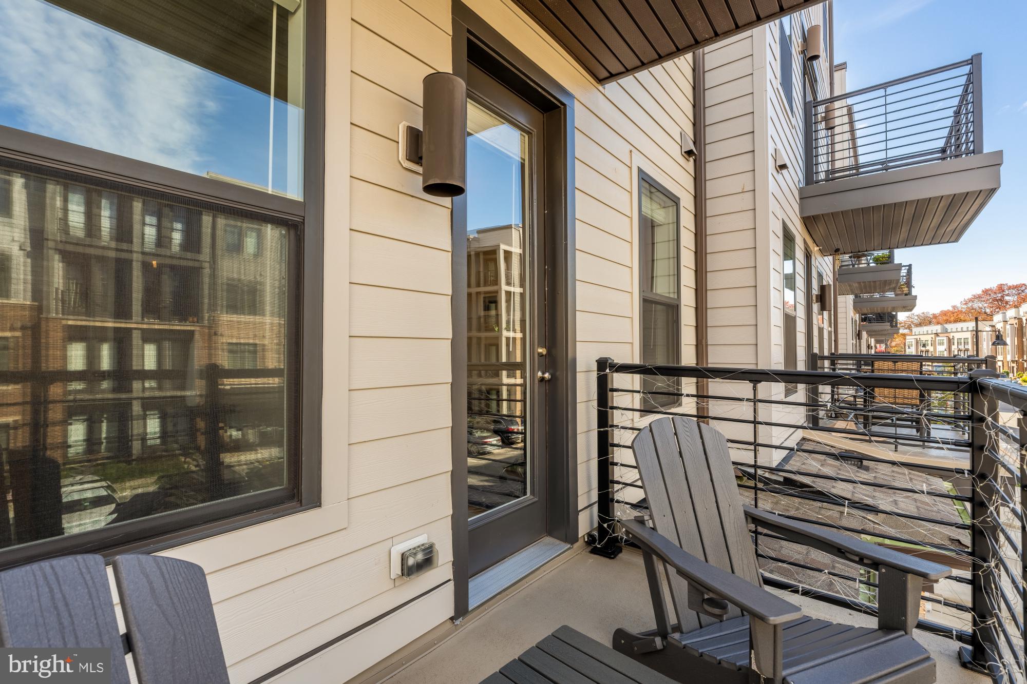 1704 Bandit Loop, Unit 20A Reston, VA 20190 - Photo 21 of 32 a view of a balcony with chairs