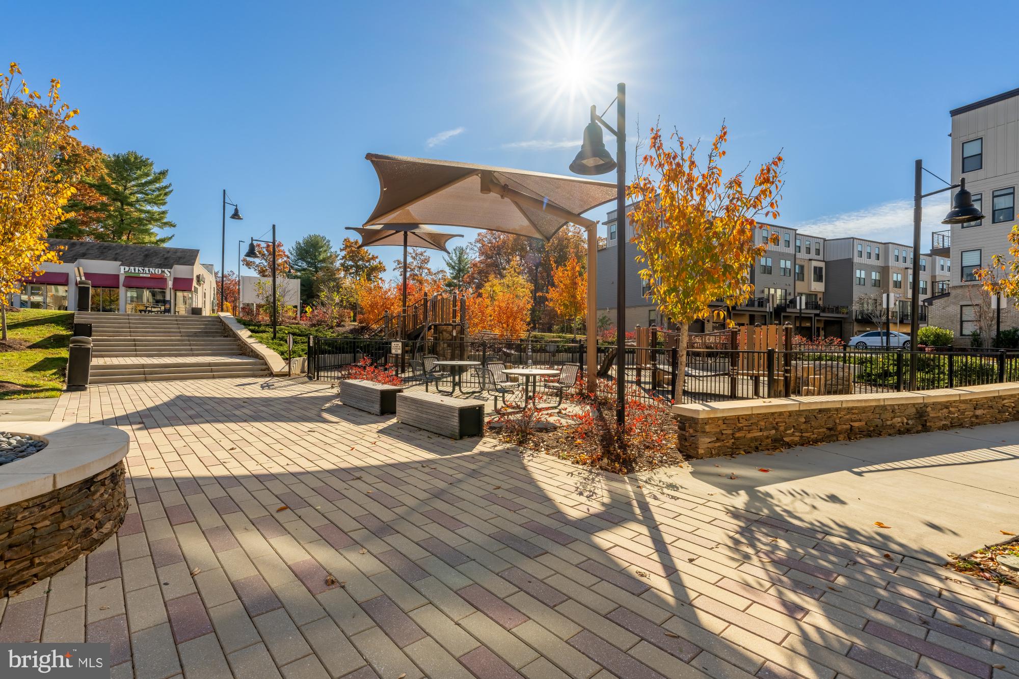 1704 Bandit Loop, Unit 20A Reston, VA 20190 - Photo 29 of 32 a view of a swimming pool with sitting area