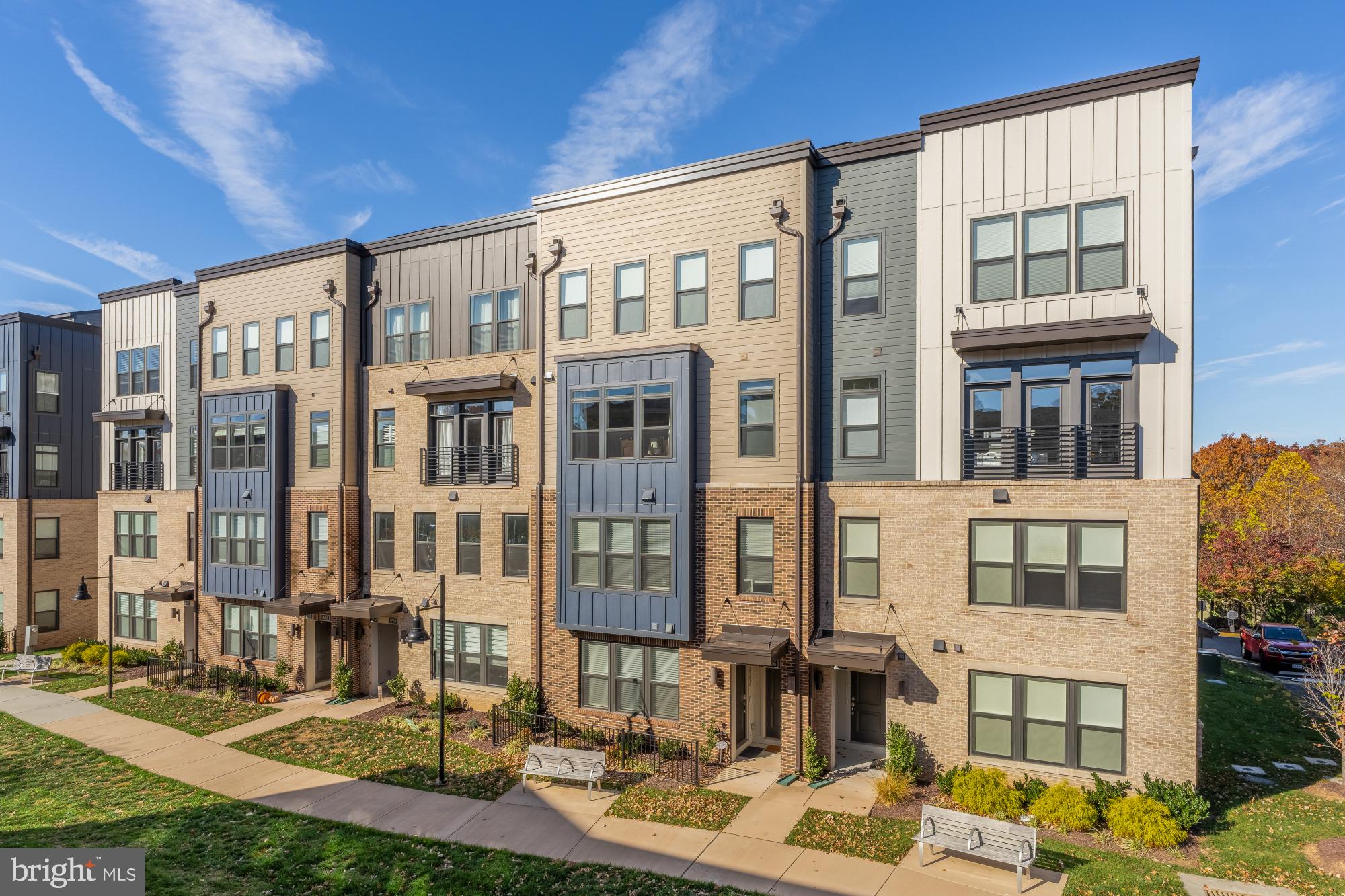 1704 Bandit Loop, Unit 20A Reston, VA 20190 - Photo 31 of 32 a front view of a building with street view
