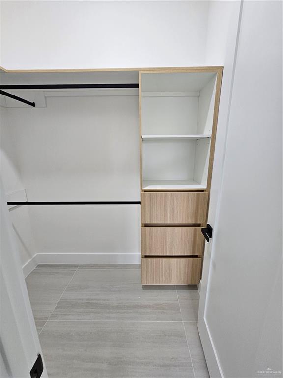 1821 South Middleton Street Edinburg, TX 78539 - Photo 18 of 26 a view of an empty walk in closet