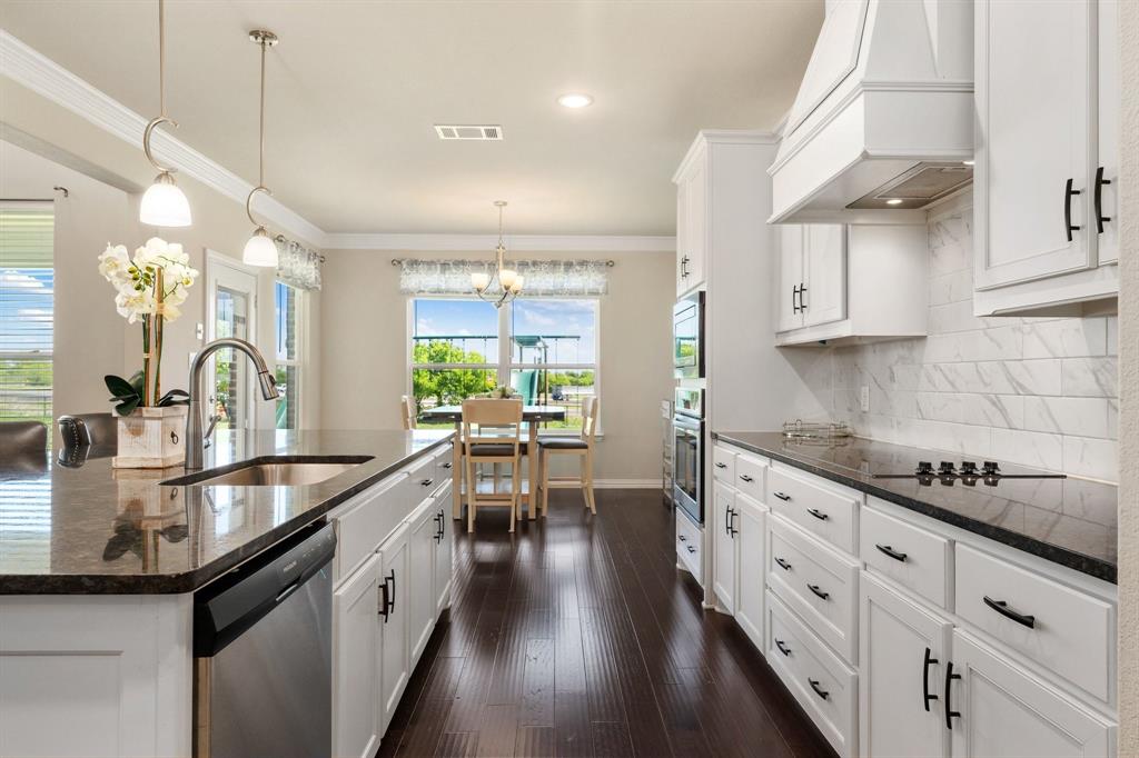 12700 Cold Spring Lane Ponder, TX 76259 - Photo 12 of 30 Kitchen with wood floors.
