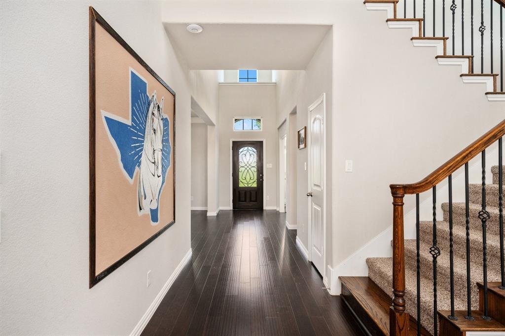 12700 Cold Spring Lane Ponder, TX 76259 - Photo 2 of 30 Beautiful wooden floors throughout the primary living areas.
