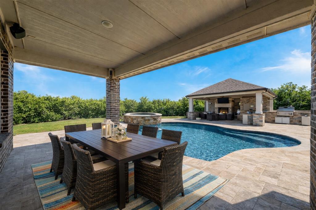 12700 Cold Spring Lane Ponder, TX 76259 - Photo 27 of 30 AI enhanced photo with privacy landscaping and future pool, spa, outdoor kitchen and cabana area.