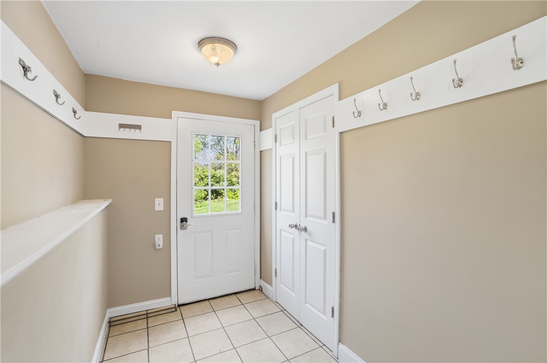 1208 Jarva Lane Springboro, OH 45066 - Photo 59 of 75 This bright mudroom offers practical storage solutions and direct outdoor access, blending convenience with everyday living.