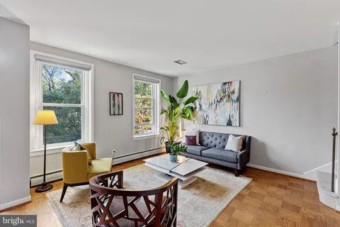 a living room with furniture and window