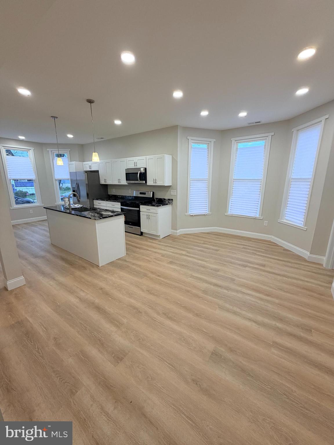 3 East Overlea Avenue, Unit 3 Baltimore, MD 21206 - Photo 21 of 45 a view of kitchen and kitchen island