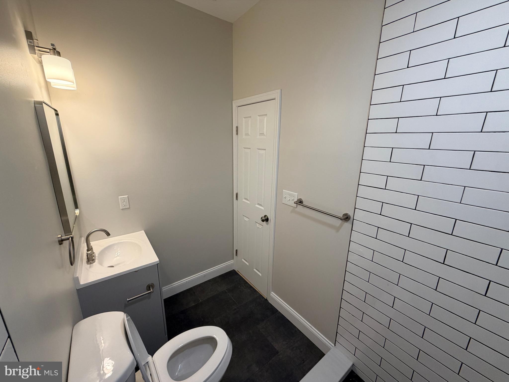 3 East Overlea Avenue, Unit 3 Baltimore, MD 21206 - Photo 22 of 45 a bathroom with a sink and toilet