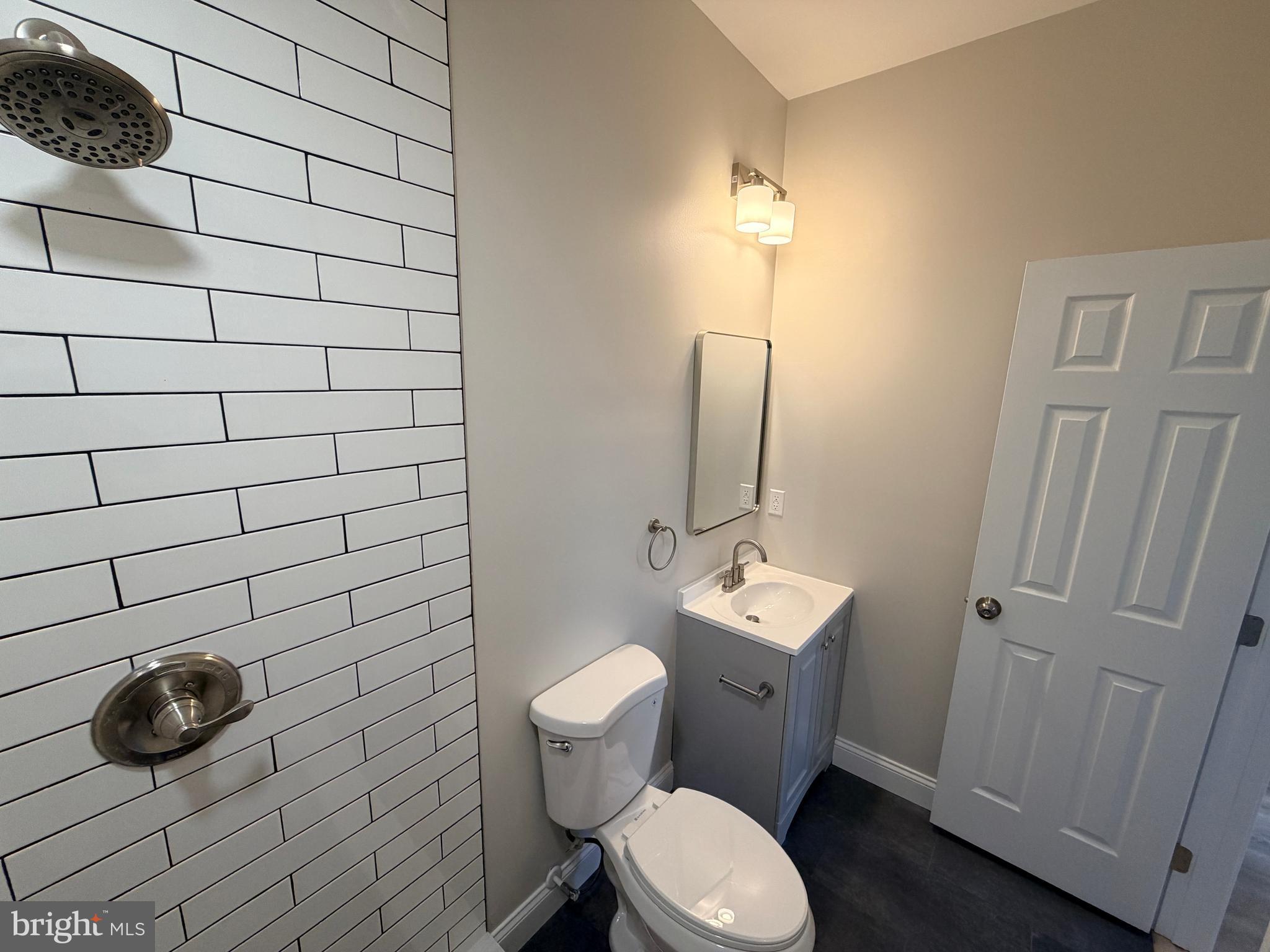 3 East Overlea Avenue, Unit 3 Baltimore, MD 21206 - Photo 33 of 45 a bathroom with a toilet and sink