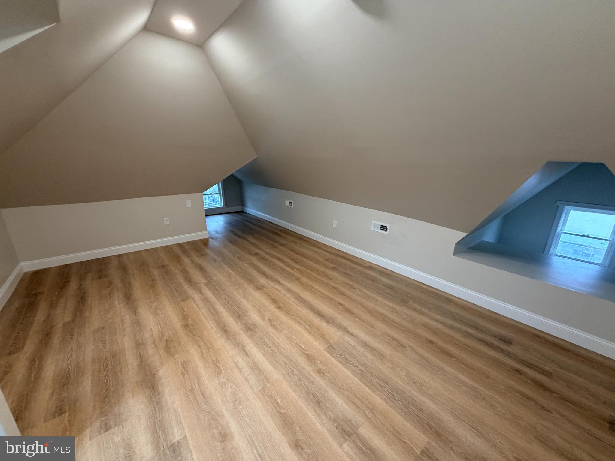 3 East Overlea Avenue, Unit 3 Baltimore, MD 21206 - Photo 36 of 45 a view of room with wooden floor