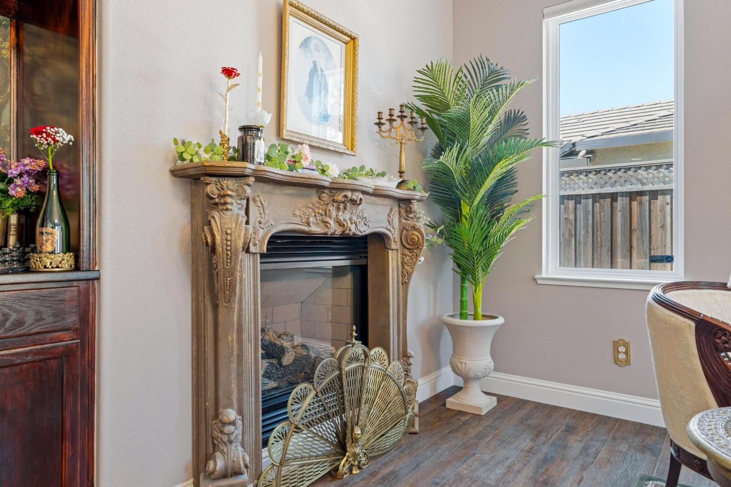 426 South Highland Avenue Ripon, CA 95366 - Photo 34 of 82 a living room with furniture and a potted plant