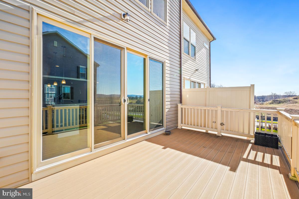 5820 Imperial Drive Frederick, MD 21703 - Photo 18 of 30 a view of a balcony with wooden floor