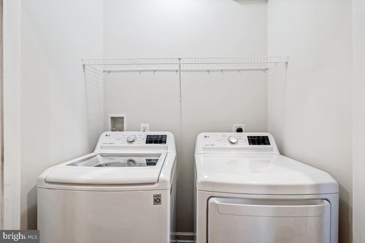 5820 Imperial Drive Frederick, MD 21703 - Photo 21 of 30 a utility room with dryer and washer