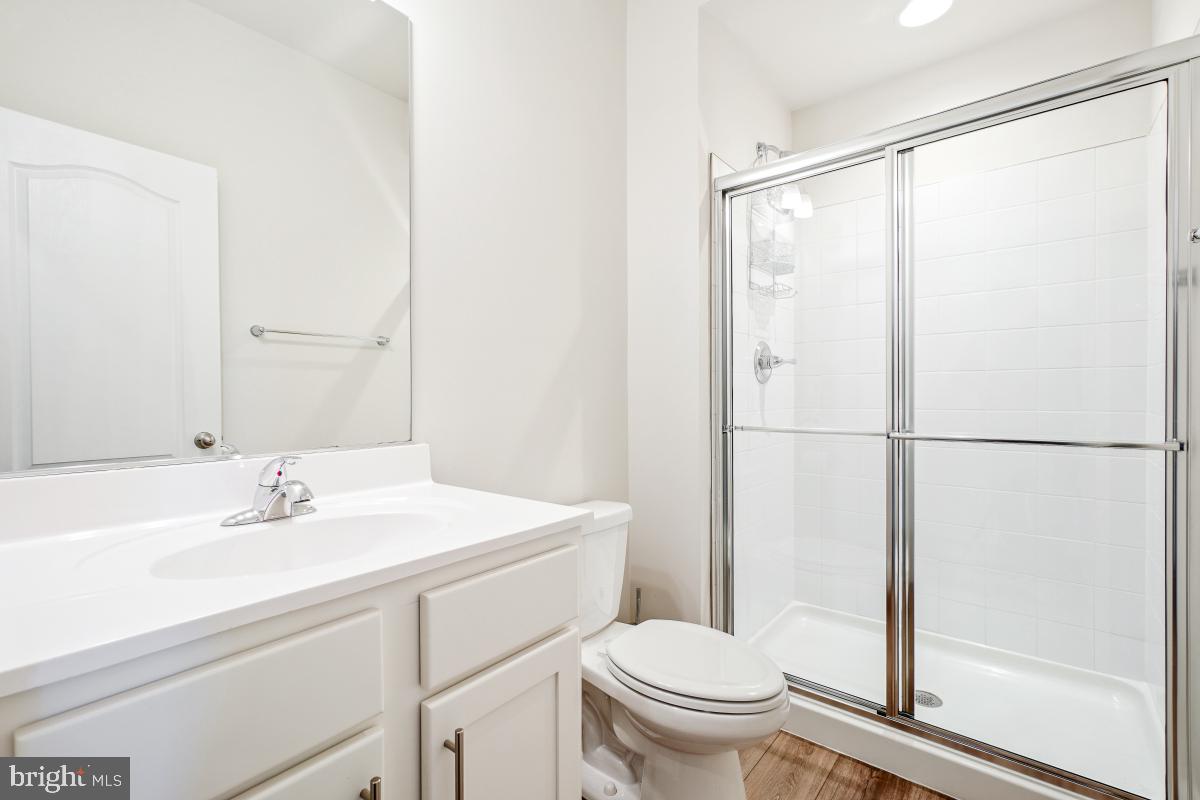 5820 Imperial Drive Frederick, MD 21703 - Photo 7 of 30 a bathroom with a sink toilet and shower