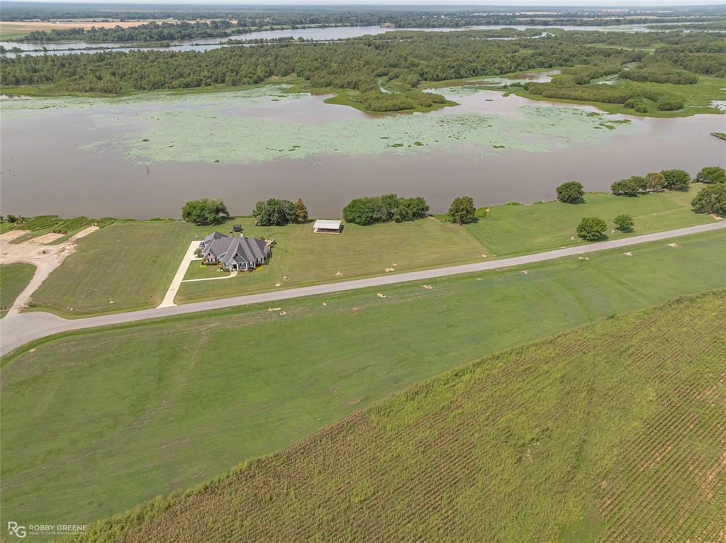 0 White Road Elm Grove, LA 71051 - Photo 9 of 13 a view of a lake with a mountain