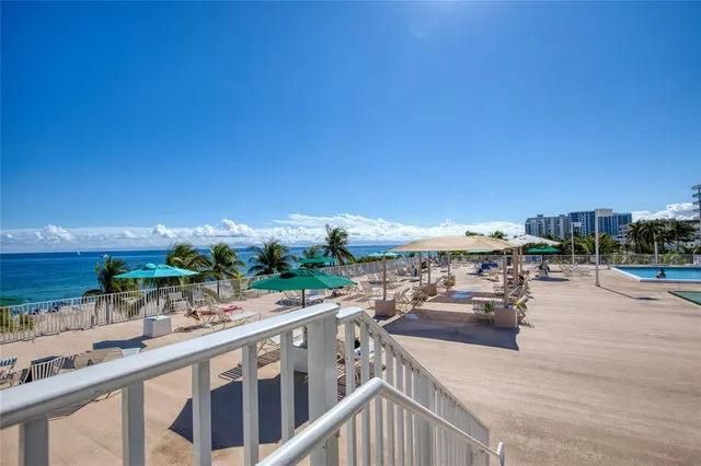 a view of a terrace with sitting area