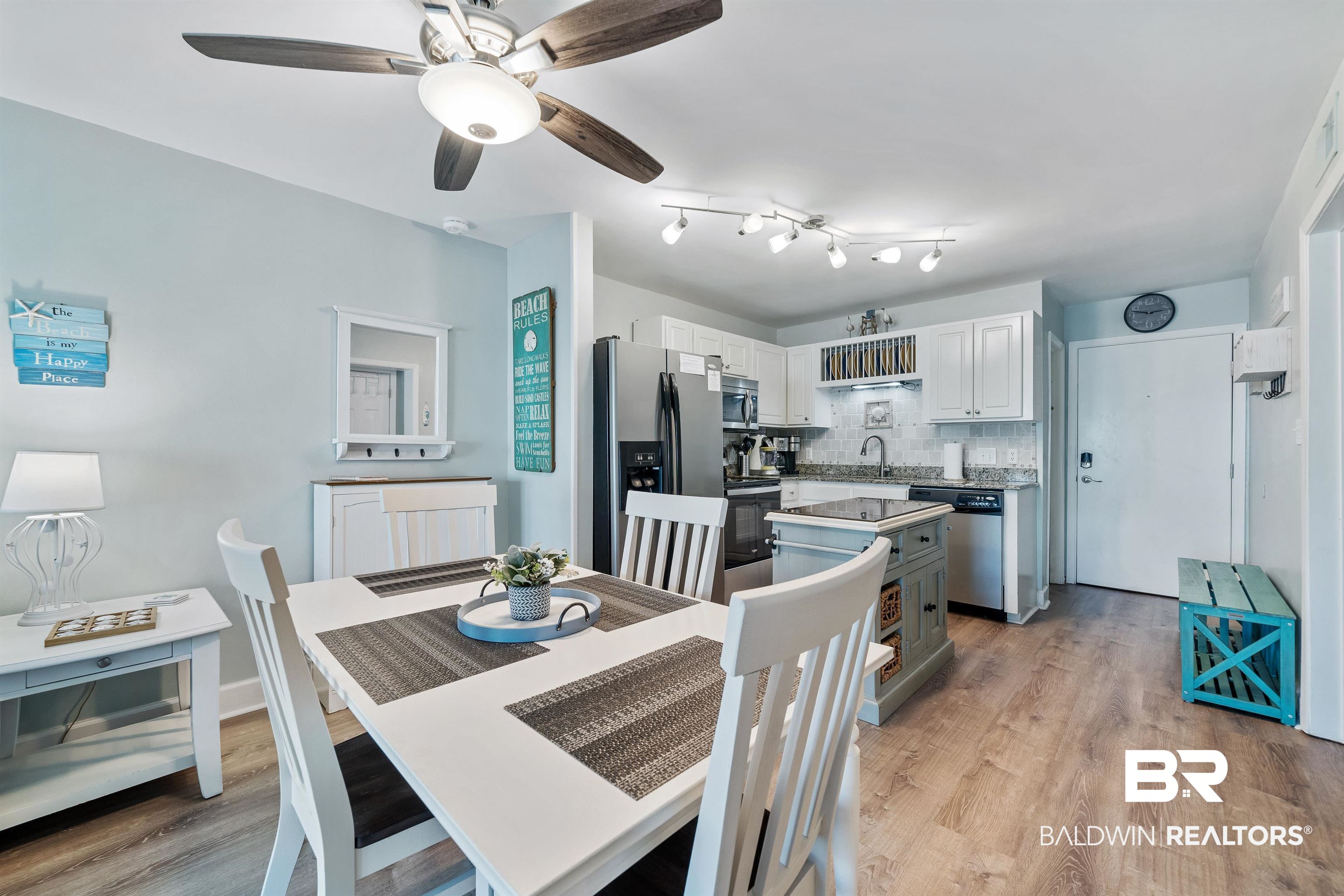 400 Plantation Road, Unit 2123 Gulf Shores, AL 36542 - Photo 13 of 44 Dining room featuring sink, rail lighting, light wood-type flooring, and ceiling fan