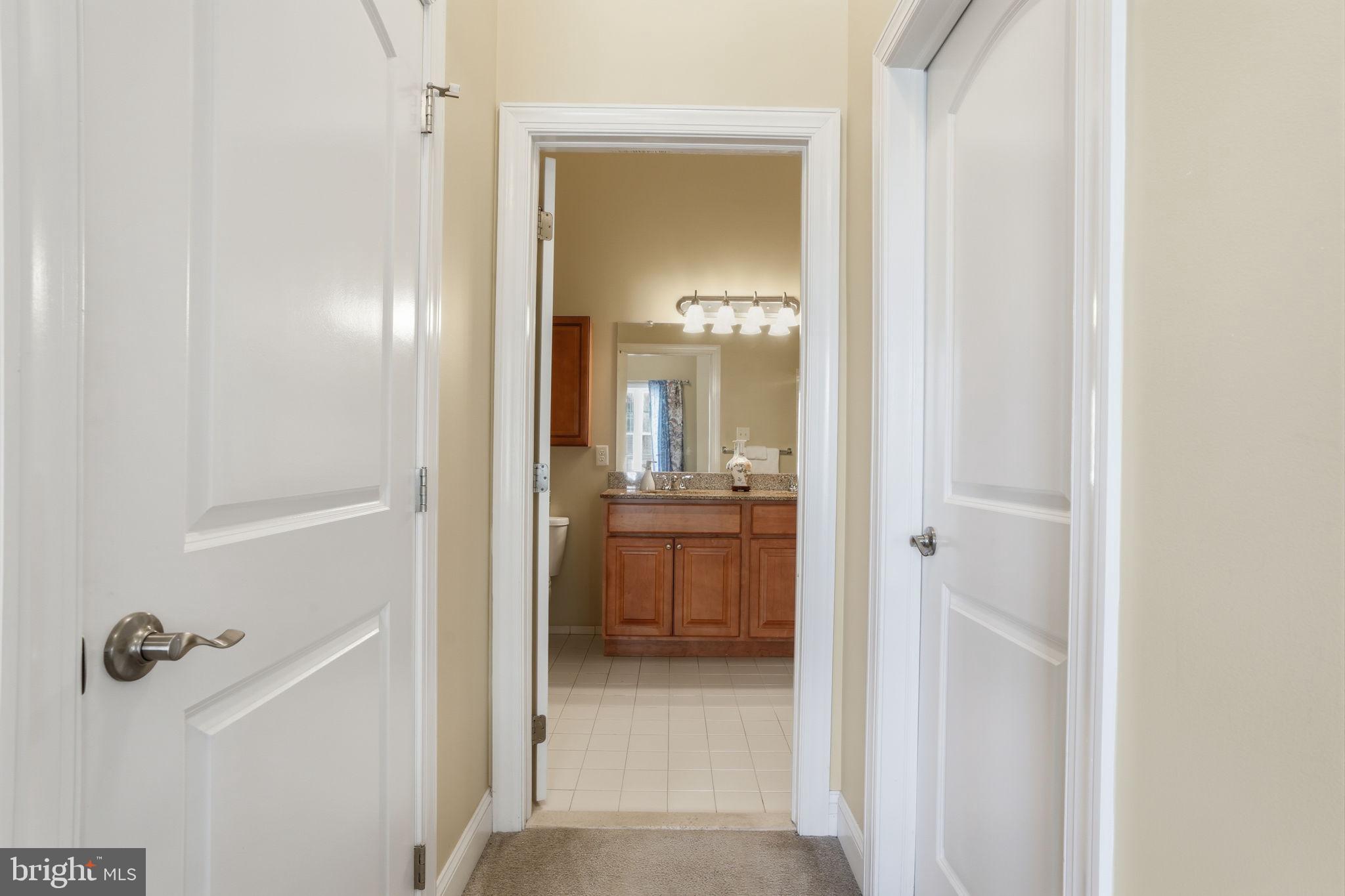 756 Street Road, Unit 1 Southampton, PA 18966 - Photo 12 of 28 Inviting hallway to serene bathroom.