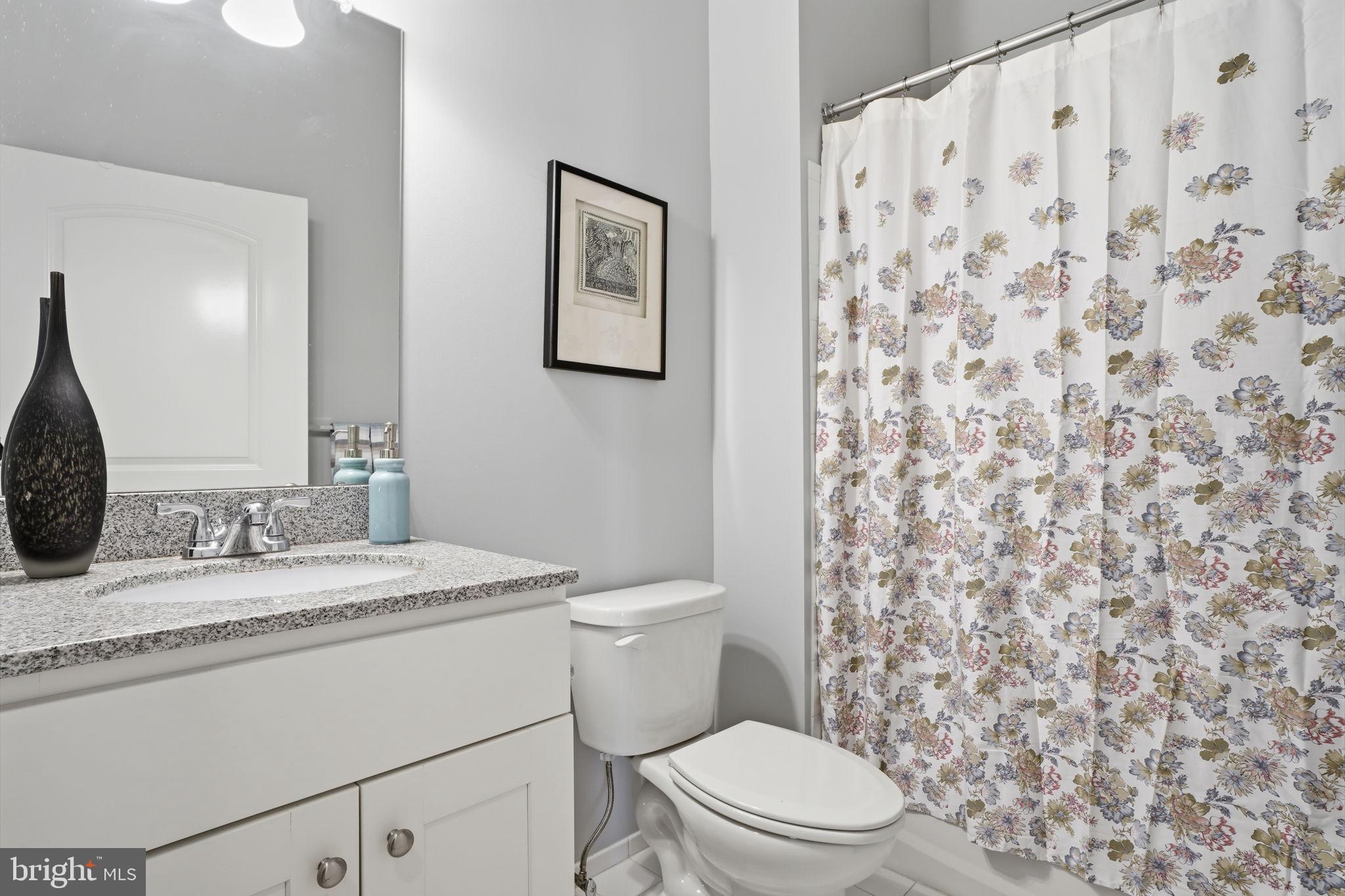 756 Street Road, Unit 1 Southampton, PA 18966 - Photo 16 of 28 Charming bathroom with floral accents.