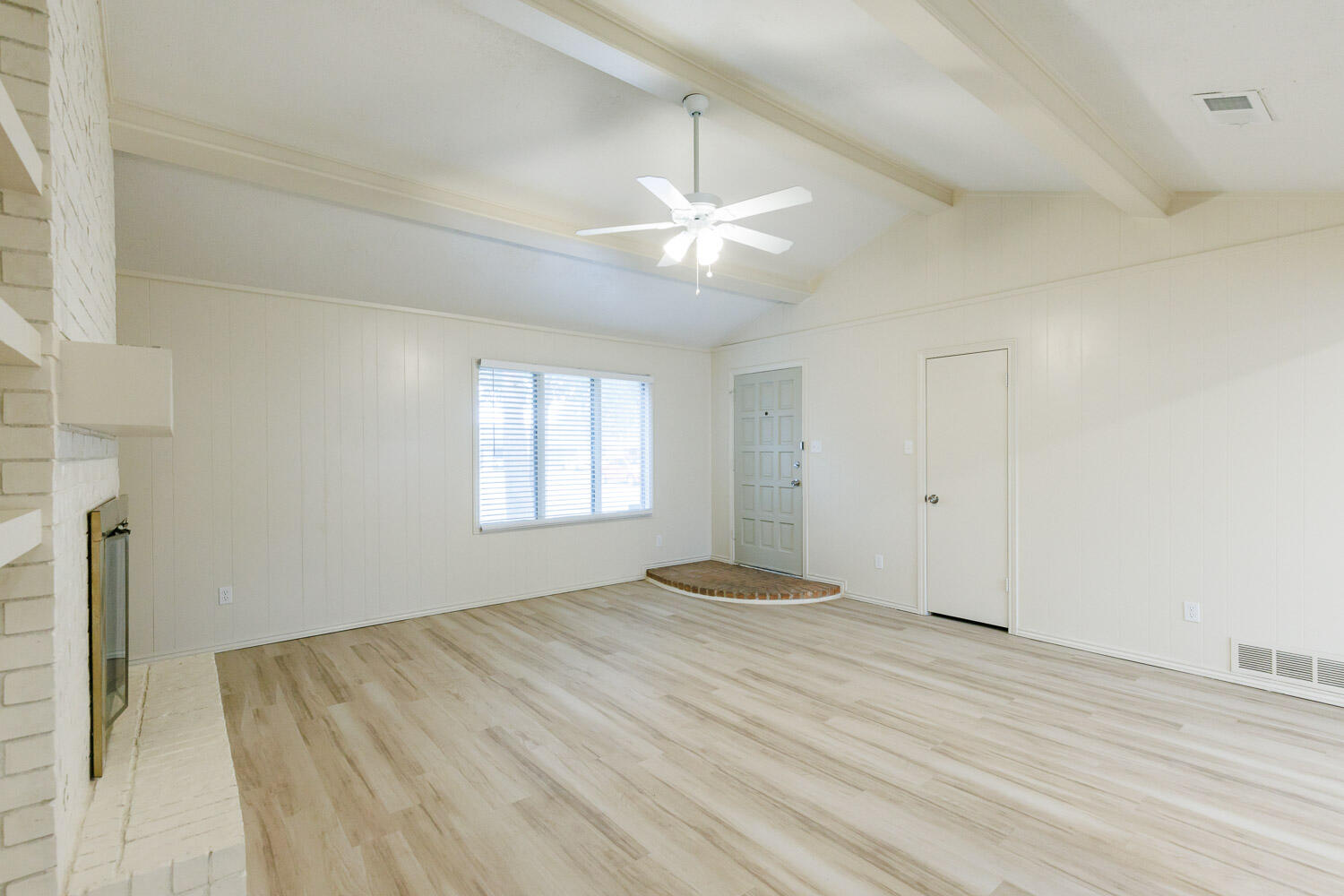 4407 75th Drive, Unit B Lubbock, TX 79424 - Photo 4 of 20 a view of an empty room with a window