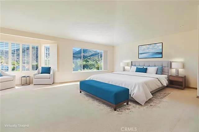 a bedroom with bed and a window