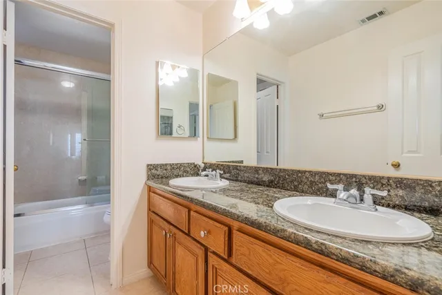 a view of balcony with wooden floor and fence