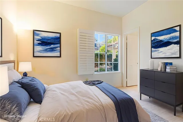 a view of a large building with a mountain in the background