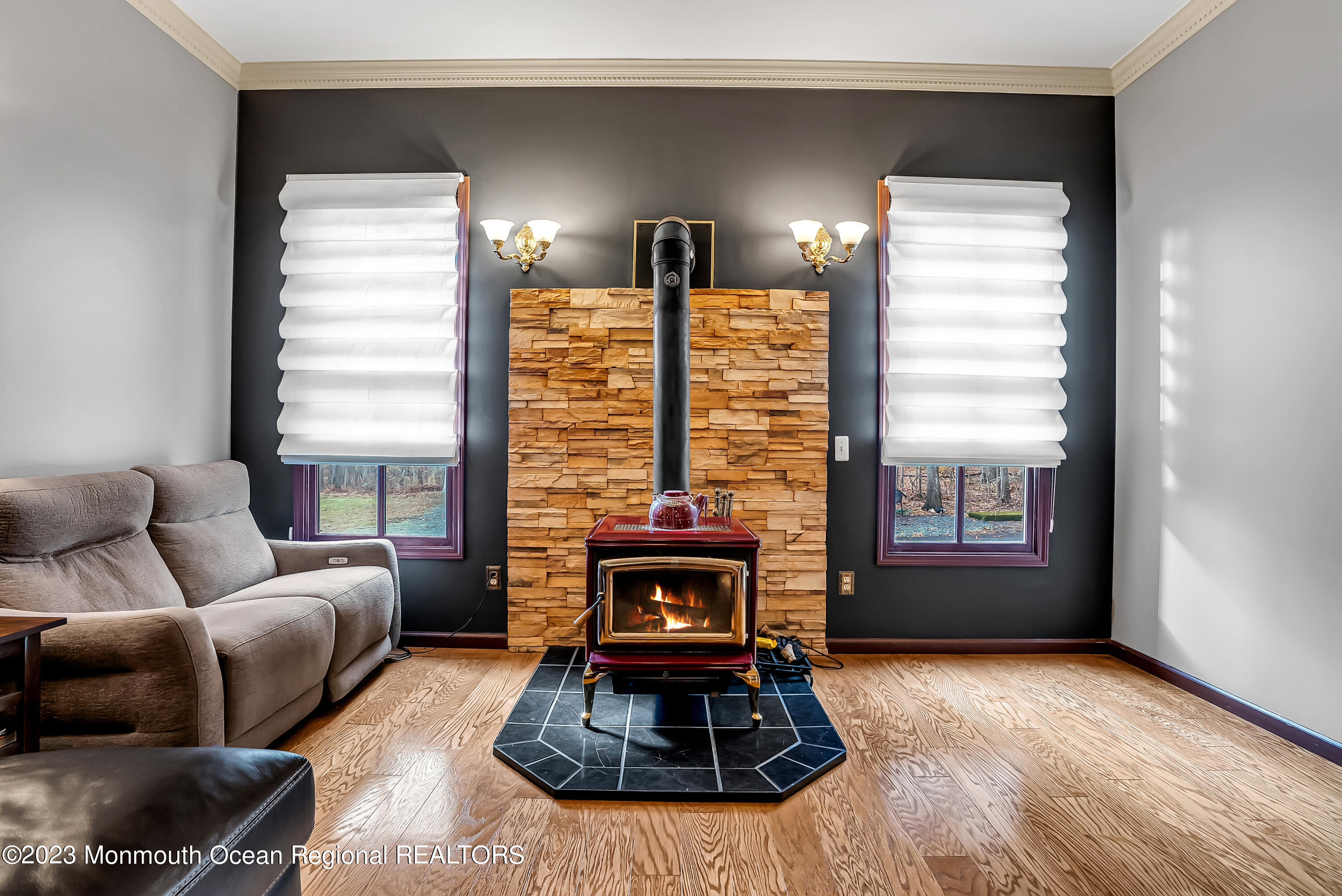 13 Pine Drive Millstone Township, NJ 08510 - Photo 16 of 56 a living room with furniture and a fireplace