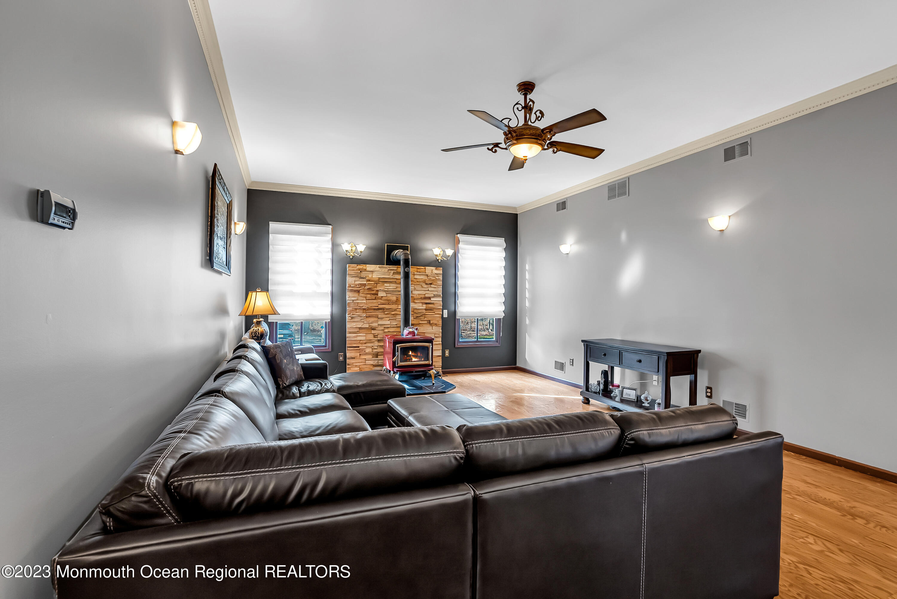 13 Pine Drive Millstone Township, NJ 08510 - Photo 17 of 56 a living room with furniture and a potted plant
