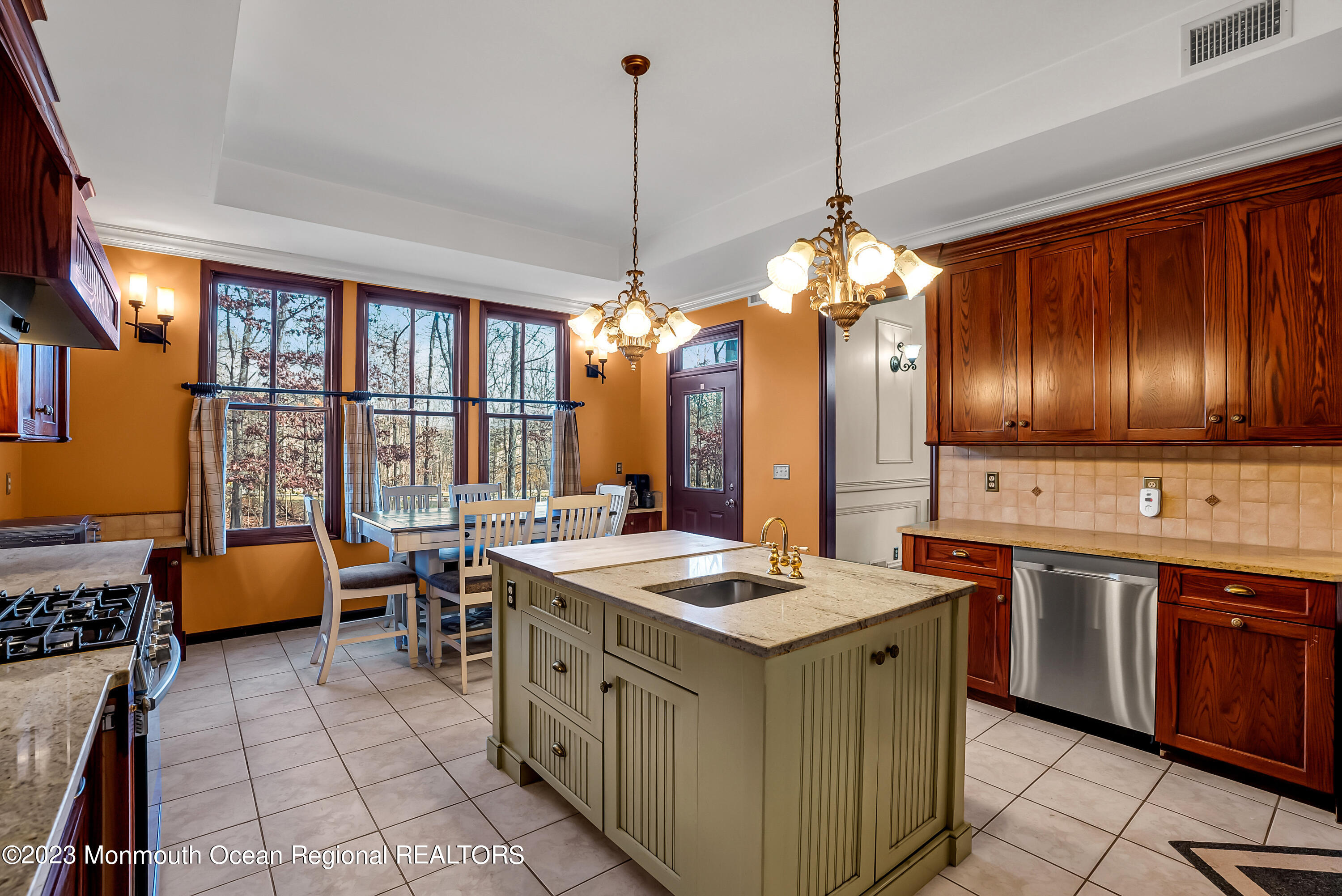 13 Pine Drive Millstone Township, NJ 08510 - Photo 19 of 56 a kitchen with stainless steel appliances granite countertop sink stove and refrigerator