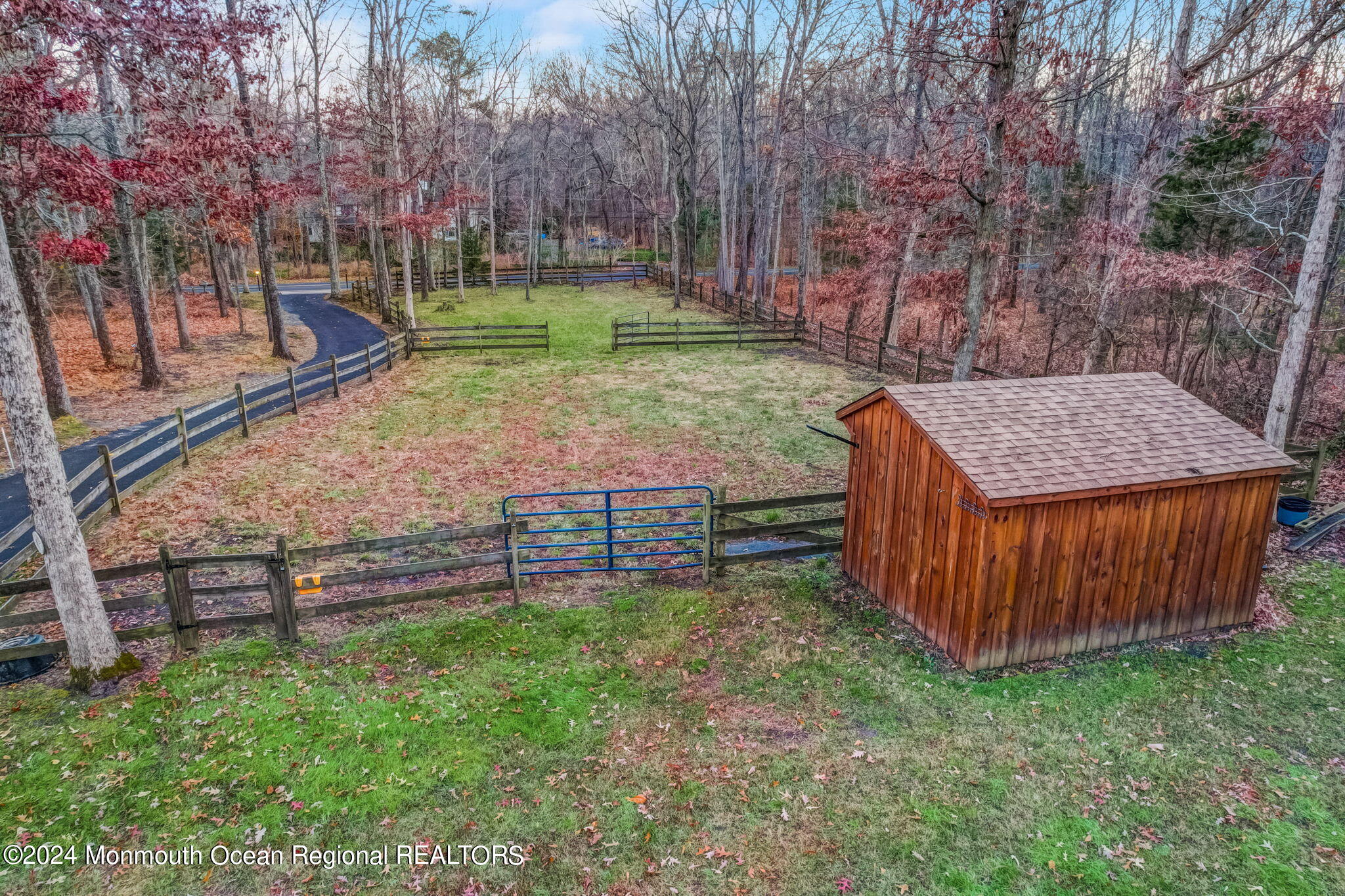 13 Pine Drive Millstone Township, NJ 08510 - Photo 2 of 56 a view of a backyard with a wooden fence