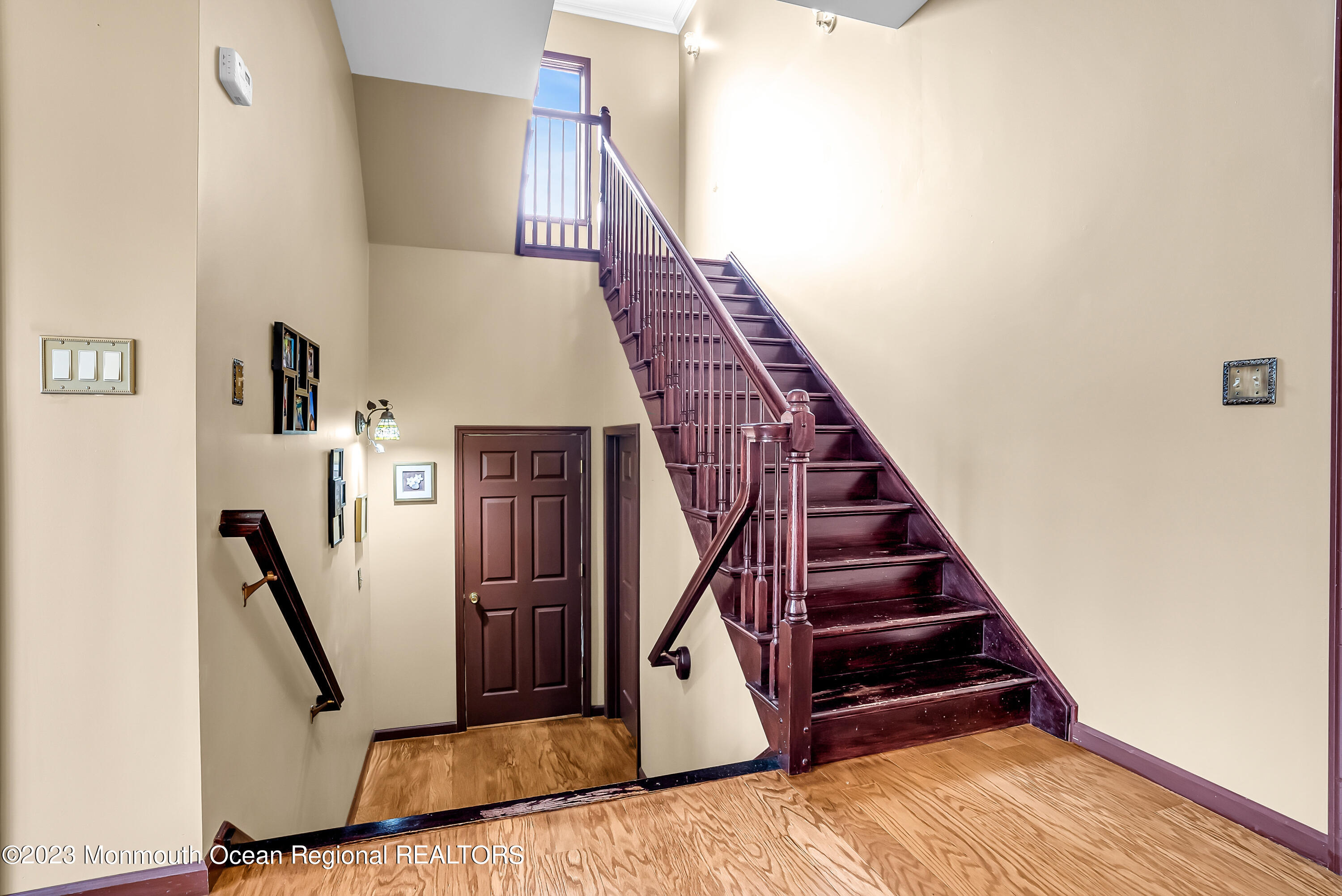 13 Pine Drive Millstone Township, NJ 08510 - Photo 30 of 56 a view of entryway and hall with wooden floor