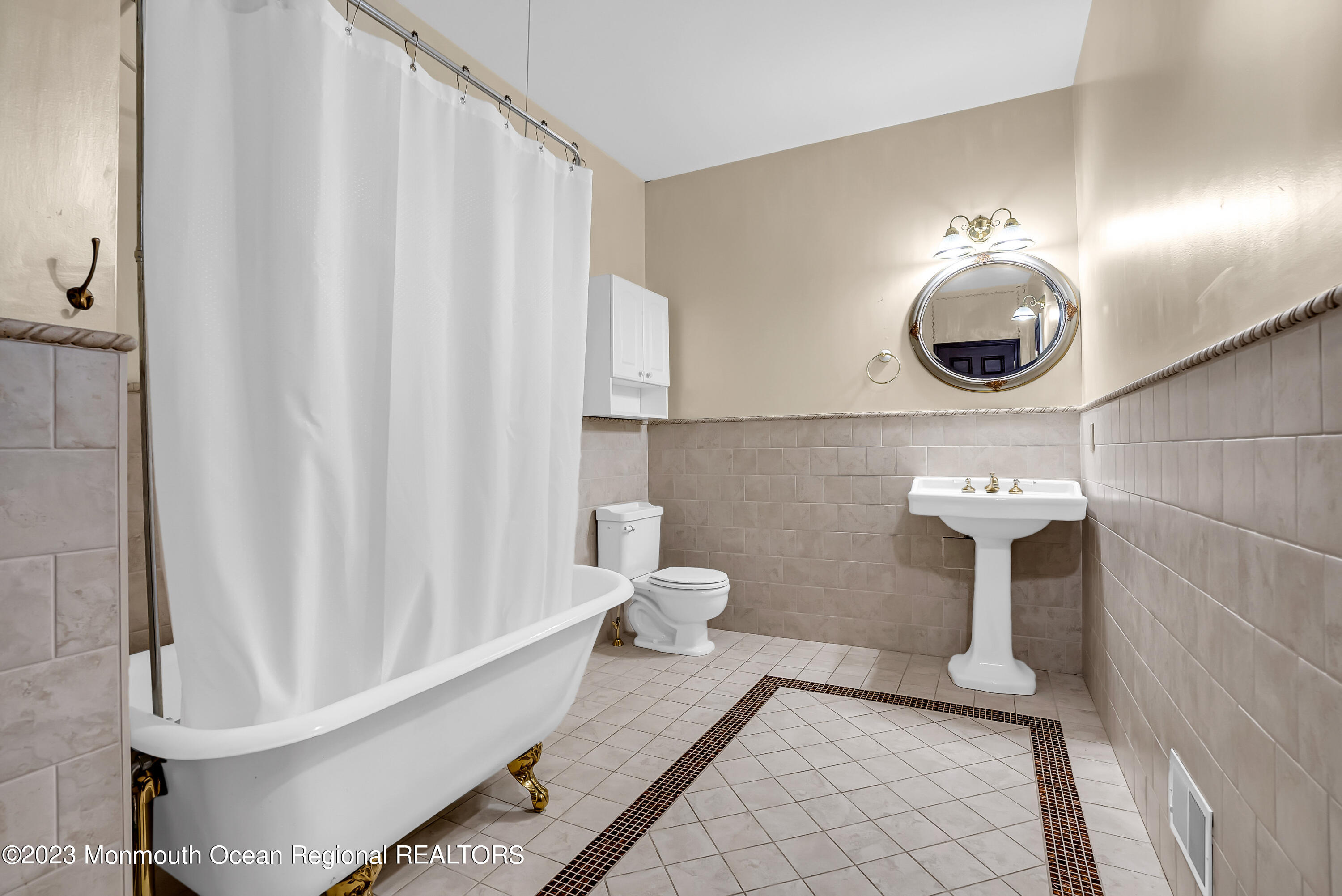 13 Pine Drive Millstone Township, NJ 08510 - Photo 38 of 56 a bathroom with a toilet and a sink