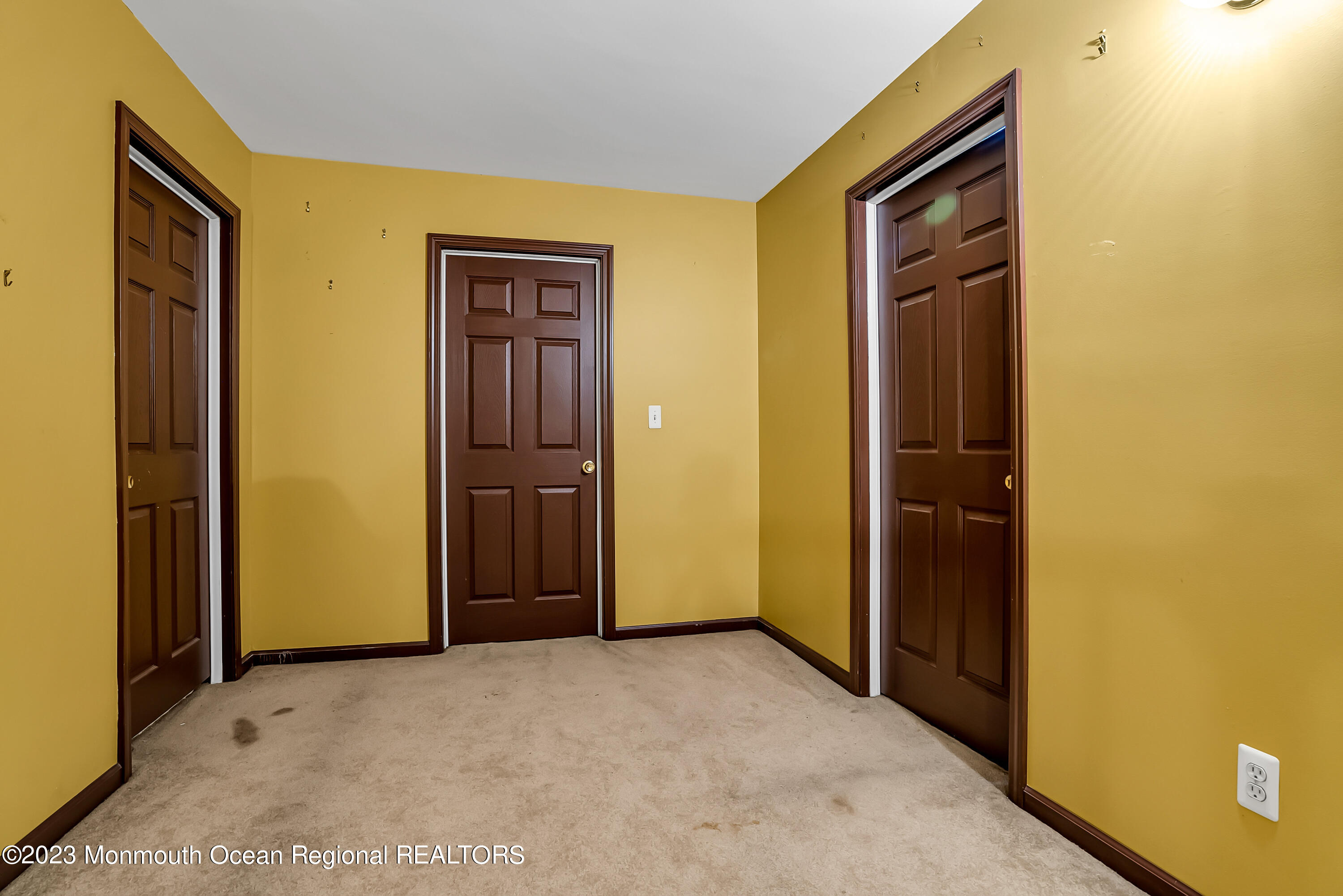13 Pine Drive Millstone Township, NJ 08510 - Photo 44 of 56 a view of a hallway with wooden floor