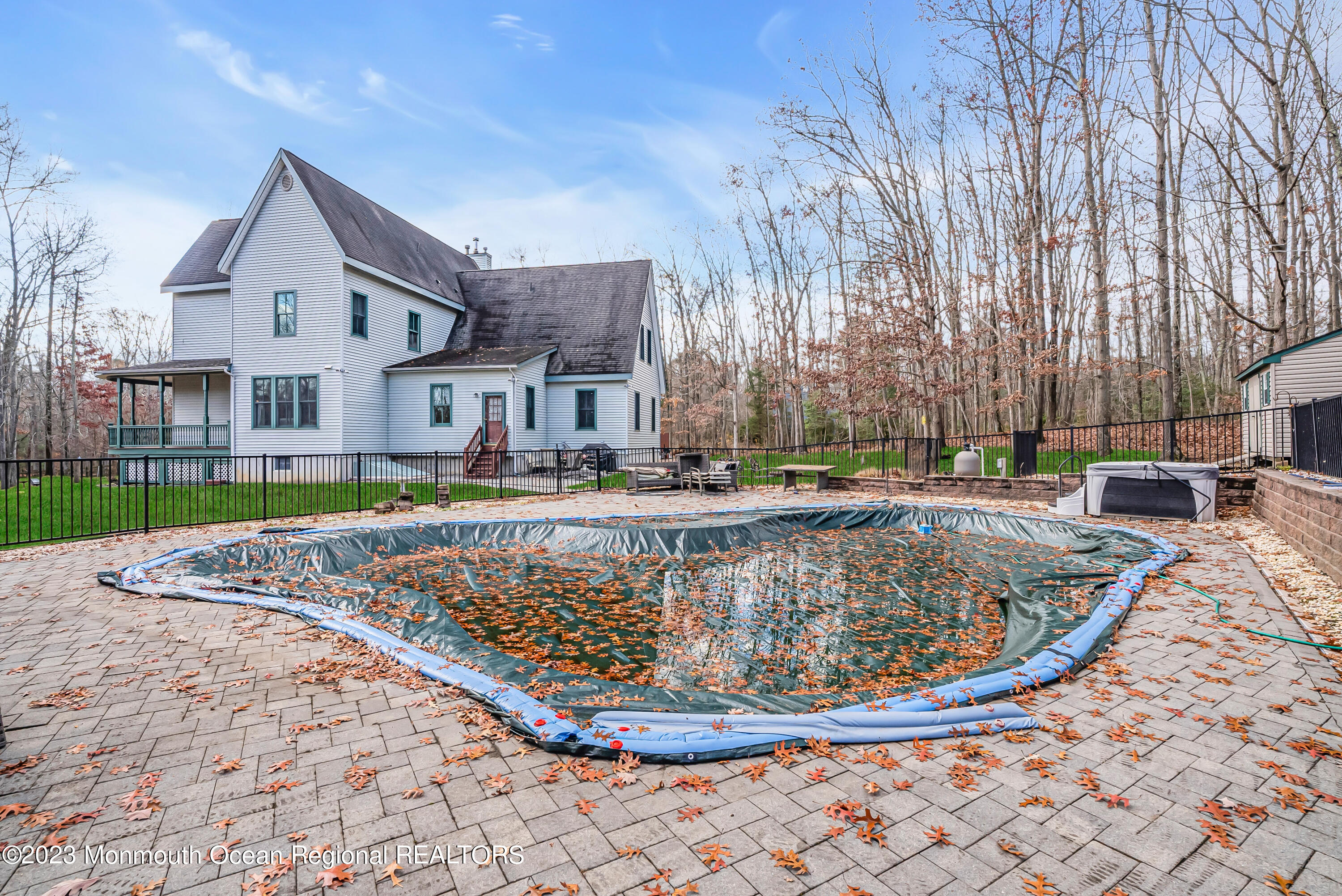 13 Pine Drive Millstone Township, NJ 08510 - Photo 49 of 56 a view of a house with a swimming pool