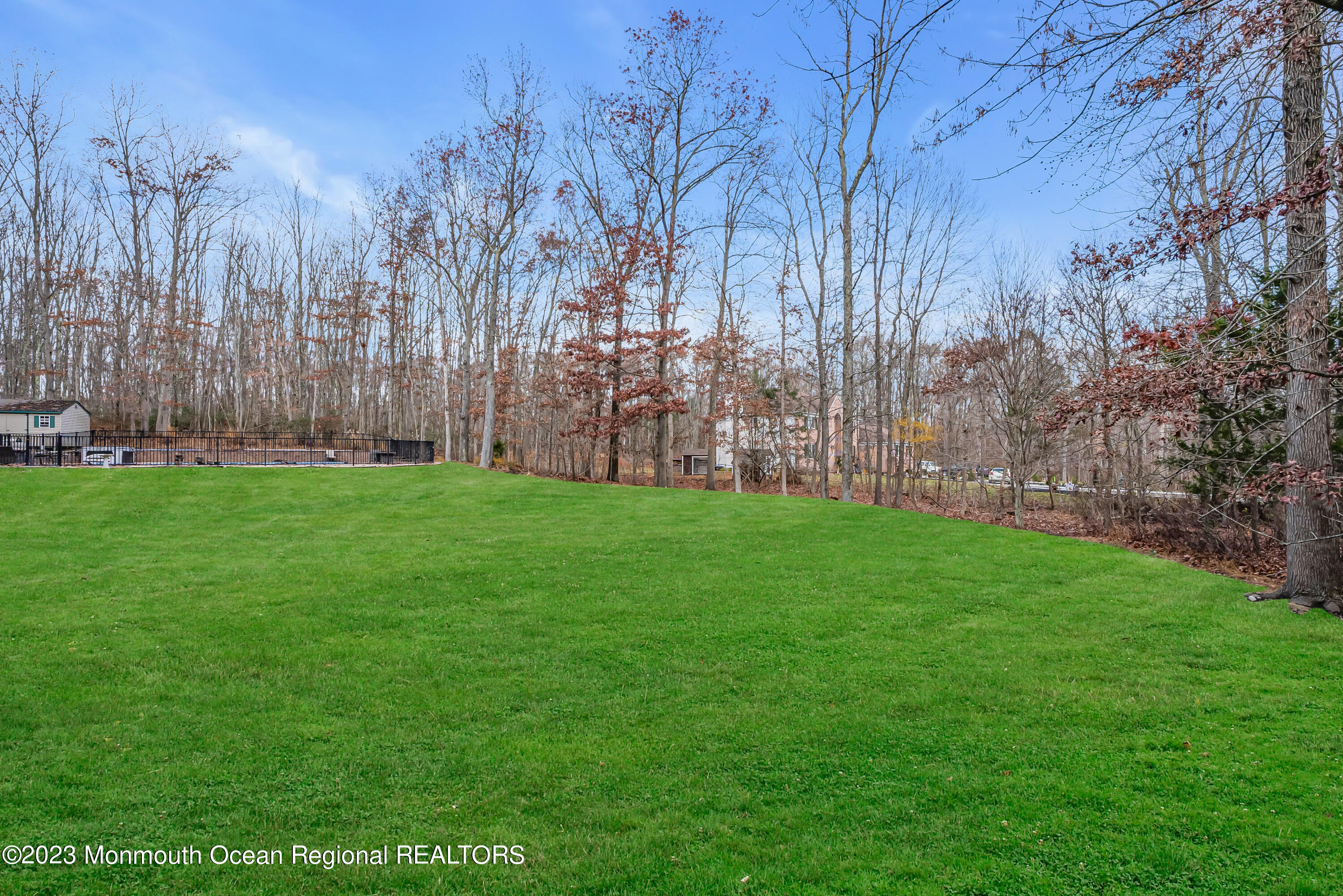13 Pine Drive Millstone Township, NJ 08510 - Photo 53 of 56 a view of a yard with large trees