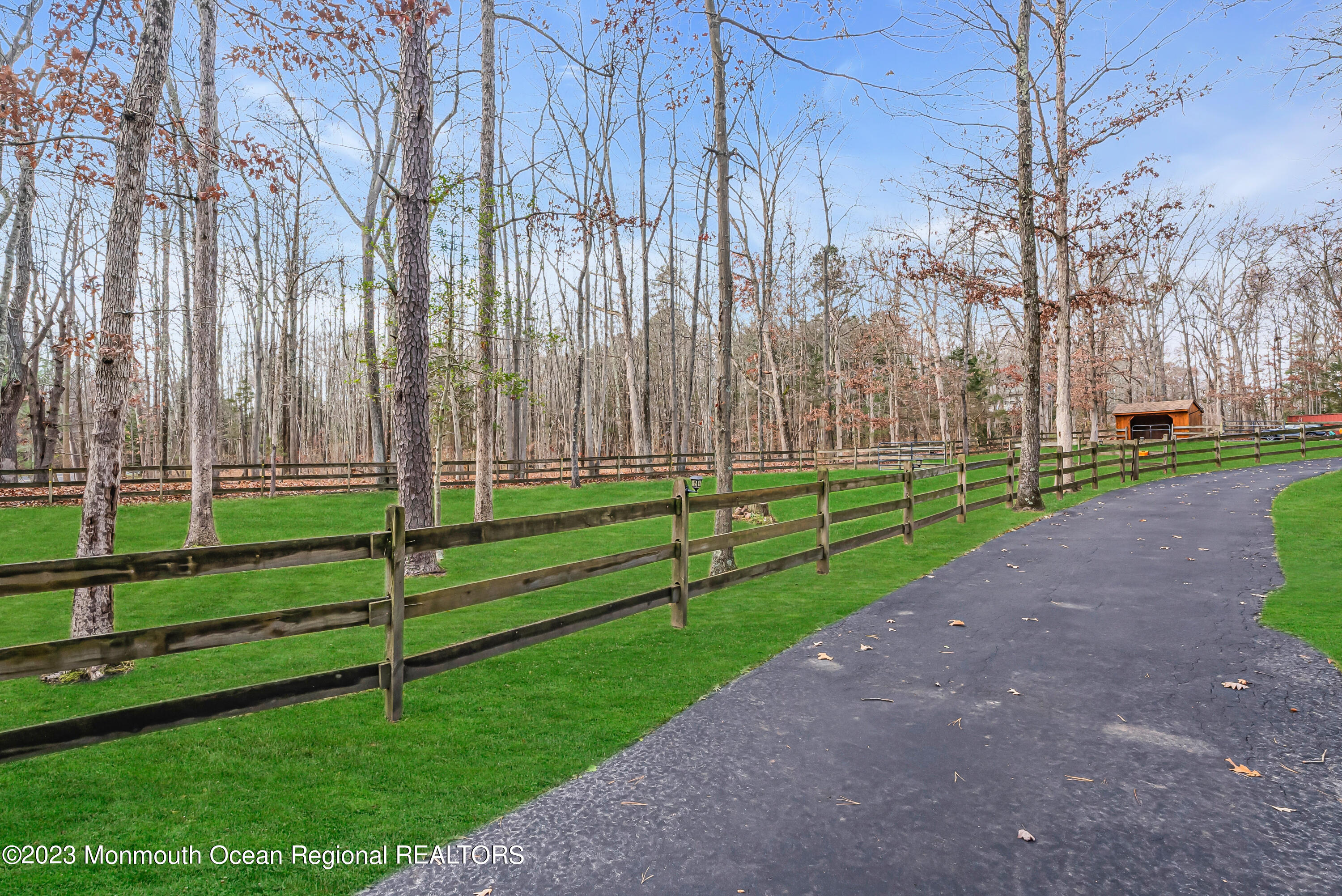 13 Pine Drive Millstone Township, NJ 08510 - Photo 8 of 56 a view of a park with large trees