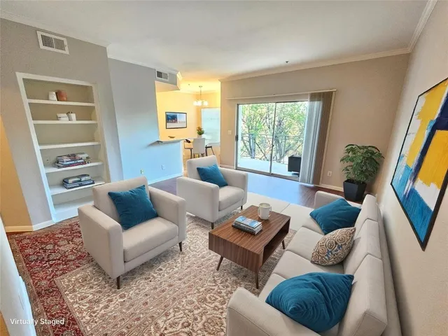 a living room with furniture and a couch