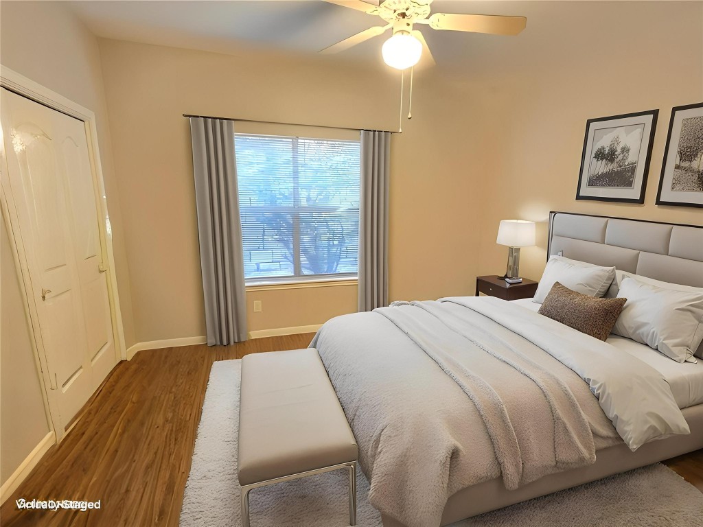 6000 Shepherd Mountain Cove, Unit 1908 Austin, TX 78730 - Photo 12 of 24 a bedroom with a bed and a chandelier