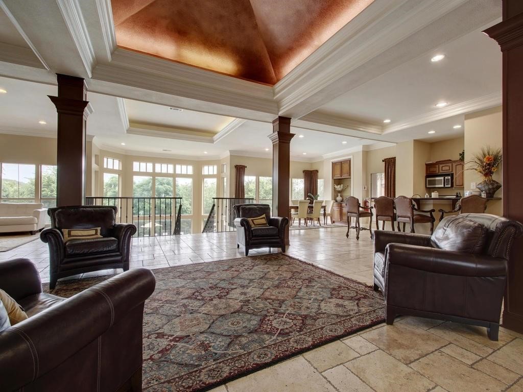 6000 Shepherd Mountain Cove, Unit 1908 Austin, TX 78730 - Photo 22 of 24 a living room with furniture and a large window