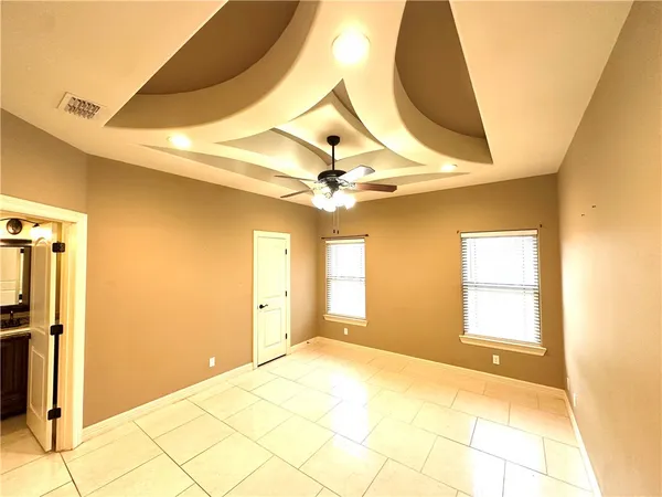 a view of a room with a chandelier