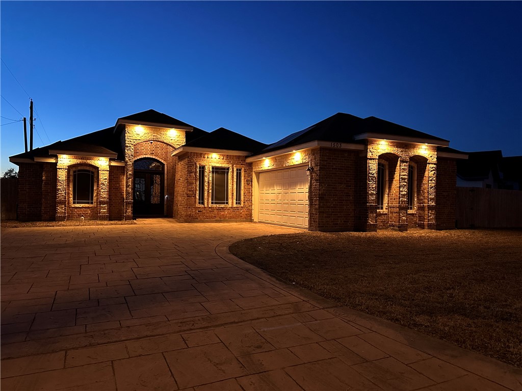 1503 Lewis Street Kingsville, TX 78363 - Photo 27 of 30 a view of a house with a yard