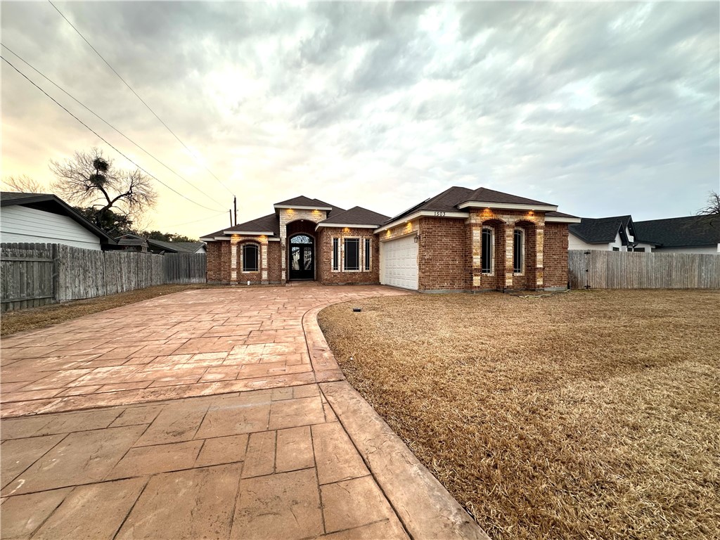 1503 Lewis Street Kingsville, TX 78363 - Photo 4 of 30 a view of a house with a yard