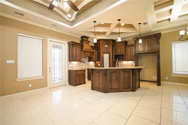 a view of a kitchen with a sink